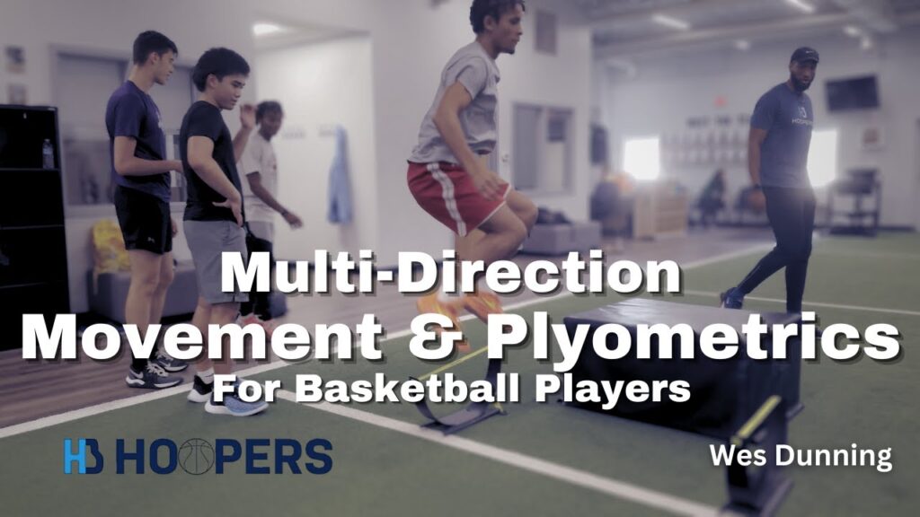 Basketball players doing plyometrics training in gym