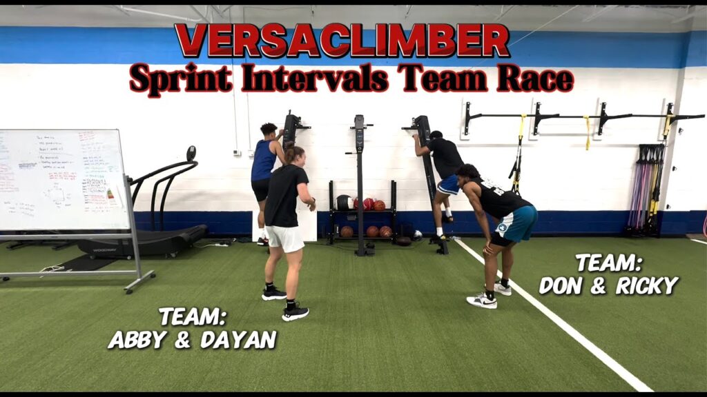 VersaClimber sprint intervals team race in gym.